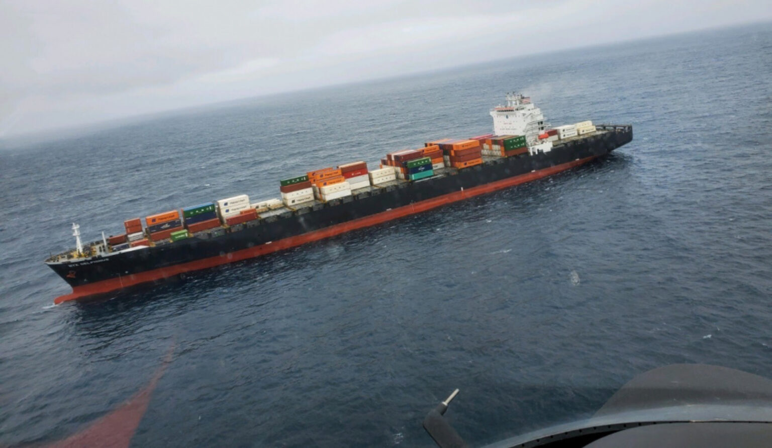 Fire-damaged container ship being towed to Port of Oakland